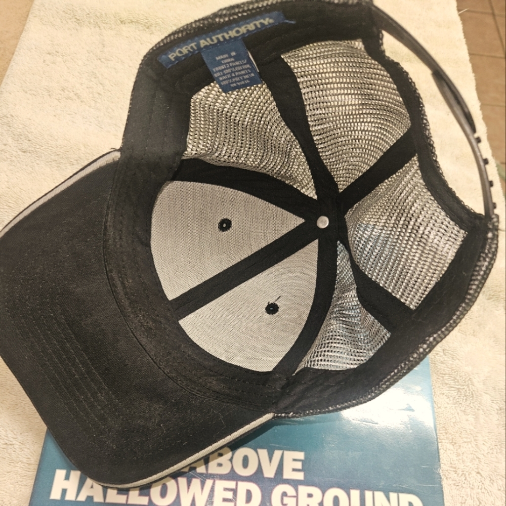 PORT AUTHORITY  CAP FOUND AT THE HALLOWED GROUNDS OF THE 911 DISATER. Book too.